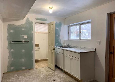 building a new full bathroom and a kitchen in a basement- ready to paint